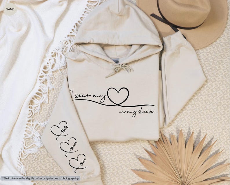 I Wear My Heart On My Sleeve Custom Sweatshirt, Cute Mom Hoodie, Mothers Day Gift, Children Names On Sleeve, Mom Birthday Gift, Grandma Gift