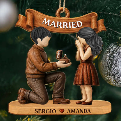 She Said Yes First Christmas Married Engaged Couple - Personalized Custom Shaped Wooden Ornament 16d35d09-db69-46c2-8c4b-cd14ee63d18c-TK1382-CIN4867_MkWebs0_e1a5f328-7275-4681-9412-35b8d8581fa8.jfif