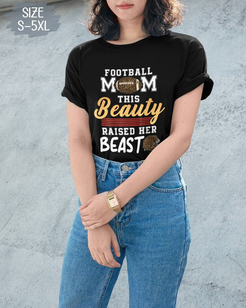 This Beauty Raised Her Beast Football Mom Shirt Funny Football Sayings Shirt 1713757561321.jpg