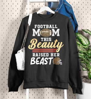 this beauty raised her beast football mom shirt funny football sayings shirt 1713757561405.jpg