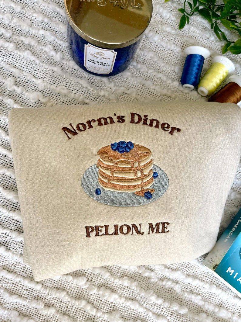 Archers Voice Mia Sheridan Norms Diner Embroidered Shirt 1715586467571.jpg