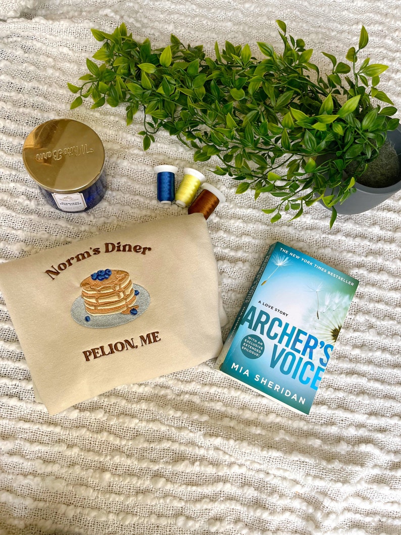 Archers Voice Mia Sheridan Norms Diner Embroidered Shirt 1715586467595.jpg