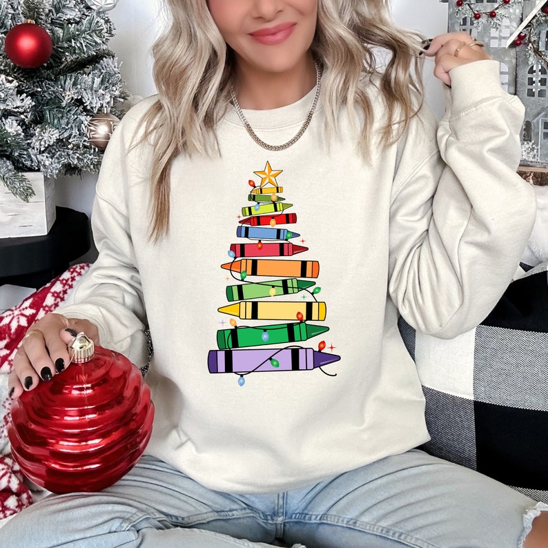 christmas crayons tree christmas teacher sweatshirt christmas gift for teacher teaching tee teachers day teachers life shirt teacher lifechristmas sweatshirt 1724921941484.jpg