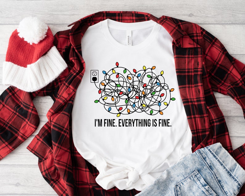 im fine everything is fine t shirt christmas t shirt t shirt women christmas t shirt women christmas lights t shirt 1724989541849.jpg