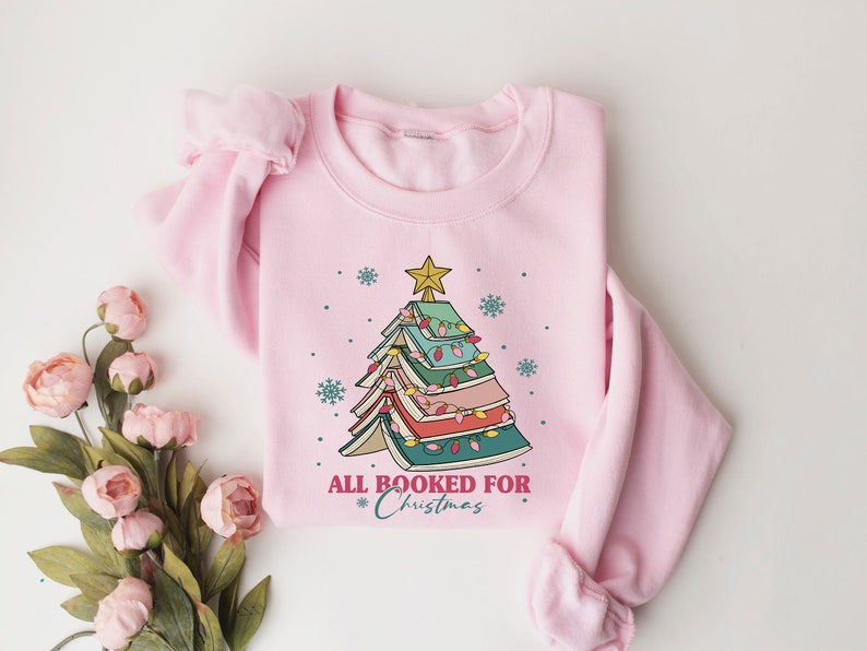 all booked for christmas shirt gift for librarianbookworm christmas sweaterchristmas book tree sweatshirtbook lovers christmas sweatshirt 1724989949250.jpg
