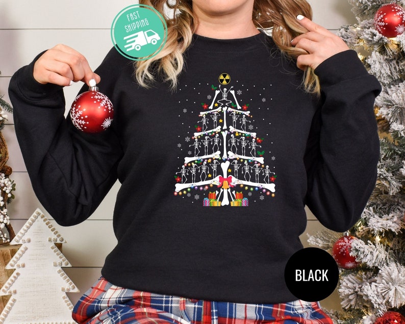 radiology christmas sweatshirt skeleton christmas tree shirt xray tech sweatshirt radiologist gift rad tech gift skeleton christmas tee 1725519443076.jpg