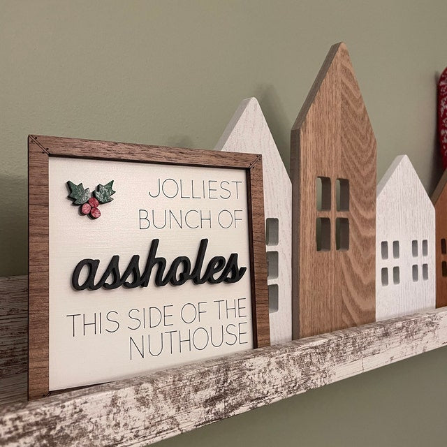 jolliest bunch of assholes this side of the nuthouse  funny christmas sign  christmas vacation  chevy chase  unique christmas gift 1726285519770.jpg