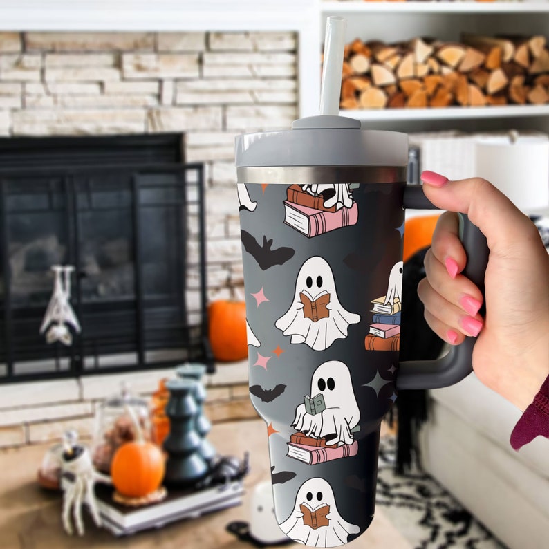 cute ghost reading tumbler 40oz halloween bookish 40oz tumbler funny reader stainless steel tumbler with lid and straw halloween 40oz cup 1726476898577.jpg