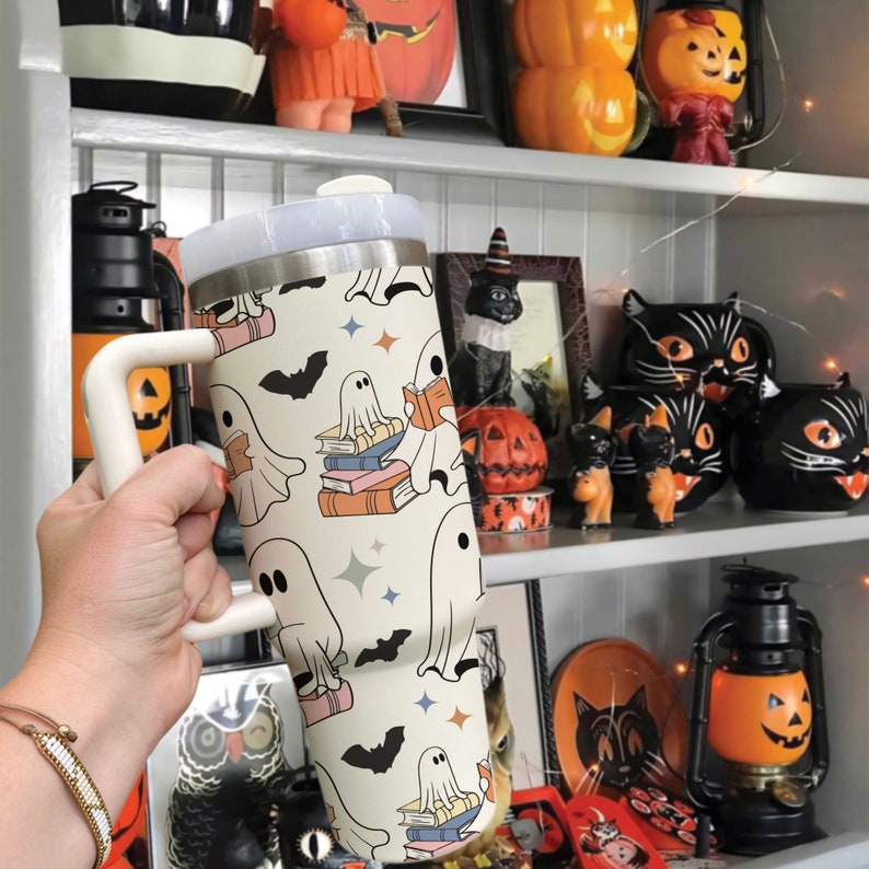 cute ghost reading tumbler 40oz halloween bookish 40oz tumbler funny reader stainless steel tumbler with lid and straw halloween 40oz cup 1726476898582.jpg