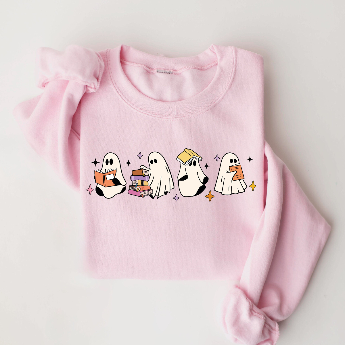 womens ghost reading books sweatshirt books lover halloween gift cute little ghost shirt spooky season bookish ghost ghost coffee shirt 1726800532820.png