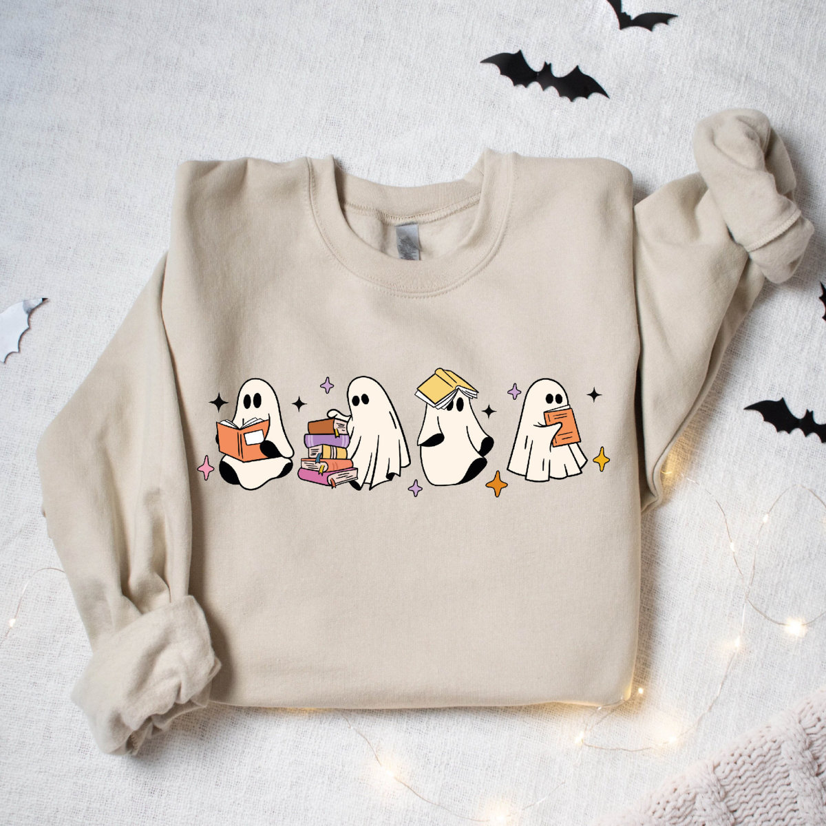 womens ghost reading books sweatshirt books lover halloween gift cute little ghost shirt spooky season bookish ghost ghost coffee shirt 1726800533028.png