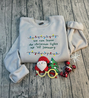 we can leave the christmas lights up til january sweatshirt  embroidered christmas lights cut hem sweatshirt side bow appliqu sweatshirt 1730362691905.jpg