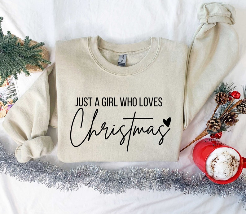 just a girl who loves christmas christmas women sweatshirt gift for women christmas shirt for women christmas lover shirt 1731298932235.jpg