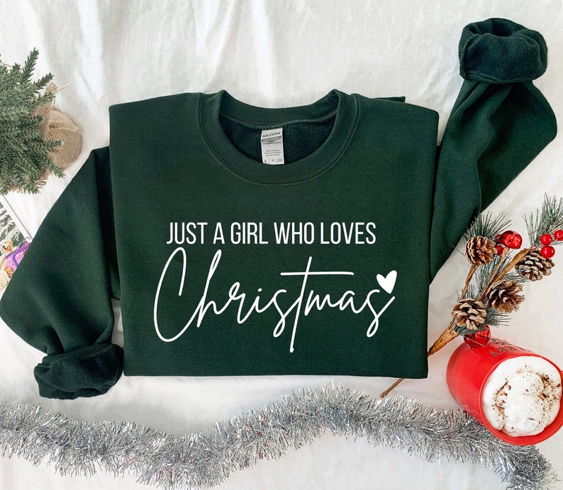 just a girl who loves christmas christmas women sweatshirt gift for women christmas shirt for women christmas lover shirt 1731298932254.jpg