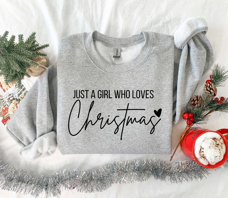 just a girl who loves christmas christmas women sweatshirt gift for women christmas shirt for women christmas lover shirt 1731298932317.jpg