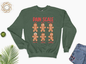 pain scale gingerbread sweatshirt christmas sweatshirt christmas cookies hoodie christmas gift for nurse xmas holidaygift for christmas 1732091424280.jpg