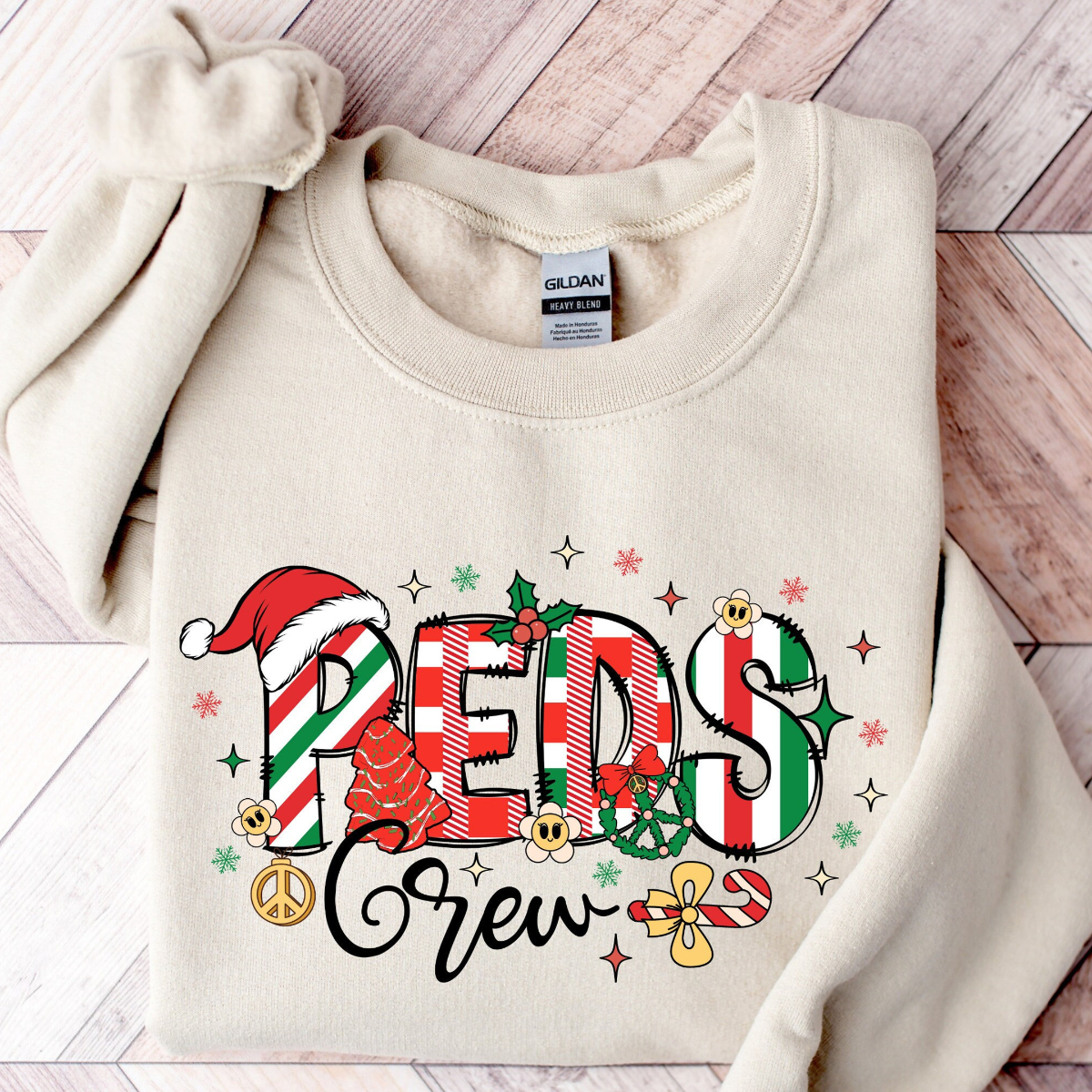 christmas peds sweatshirt christmas pediatrics sweatshirt peds crew shirt peds nurse shirt christmas pediatric nurse giftchristmas gift 1733299146659.png