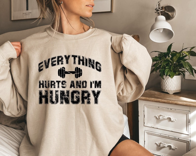 everything hurts and im hungry sweatshirt gym hoodie for women fitness lover shirt workout sweater gift for girlfriend 1736931131832.jpg