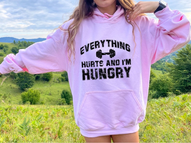everything hurts and im hungry sweatshirt gym hoodie for women fitness lover shirt workout sweater gift for girlfriend 1736931131856.jpg