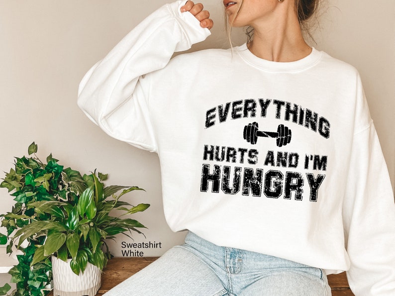 everything hurts and im hungry sweatshirt gym hoodie for women fitness lover shirt workout sweater gift for girlfriend 1736931131904.jpg