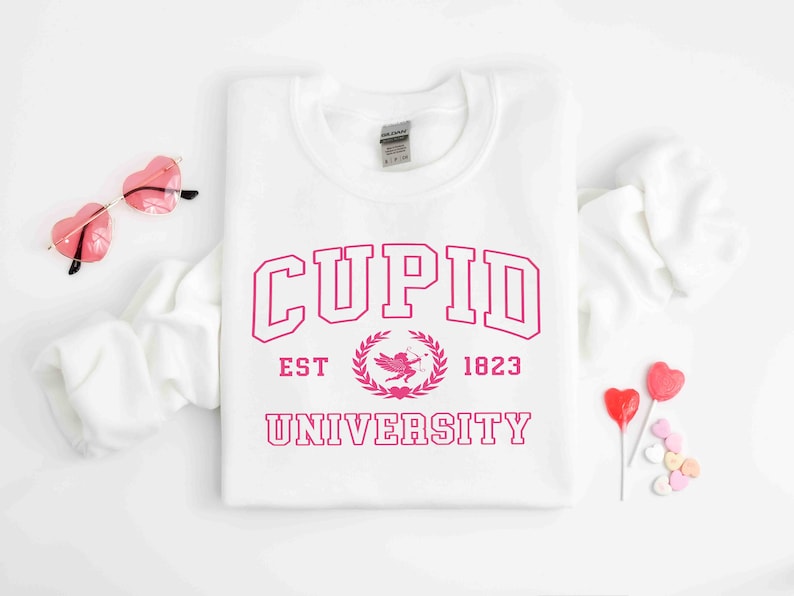 cupid university sweatshirt cute valentines day shirt funny college sweatshirt love crewneck sweatshirt cupid sweater 1737694832744.jpg