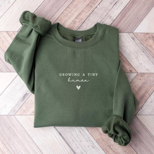growing a tiny human soon to be mom shirt im pregnant daughter expecting mom gift pregnancy reveal baby announcement ideas 1742872131872.jpg