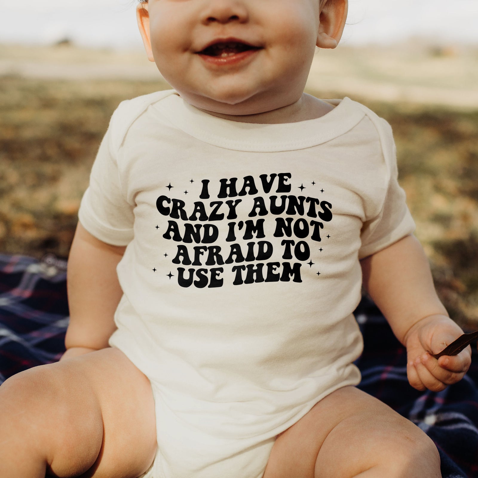 i have crazy aunts and im not afraid to use them onesies cute auntie bodysuit funny aunt baby shower gift 1745810560187.jpg