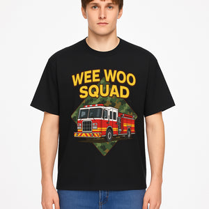Wee Woo Squad Fire Truck Graphic Tee - Fun Firefighter Kids Shirt, Camouflage Background, Unique Design for Little Heroes - T-shirt 1757912448857.jpg