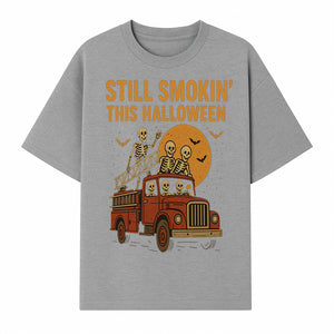 Vintage Skeleton Fire Truck Halloween Graphic T-Shirt, Retro Spooky Apparel, Still Smokin' This Halloween, Fun Costume Party Wear - T-shirt 1757912455470.jpg