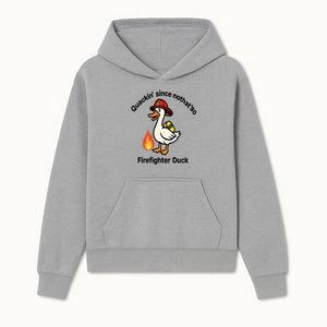 Firefighter Duck Design - Quackin' Since '90 Funny Fireman Graphic for Animal Lovers and Firefighting Enthusiasts - Hoodie 1757912469658.jpg