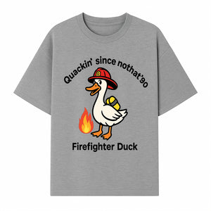 Firefighter Duck Design - Quackin' Since '90 Funny Fireman Graphic for Animal Lovers and Firefighting Enthusiasts - T-shirt 1757912474032.jpg