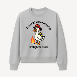 Firefighter Duck Design - Quackin' Since '90 Funny Fireman Graphic for Animal Lovers and Firefighting Enthusiasts - Sweatshirt 1757912476329.jpg