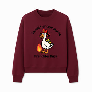 Firefighter Duck Design - Quackin' Since '90 Funny Fireman Graphic for Animal Lovers and Firefighting Enthusiasts - Sweatshirt 1757912476769.jpg