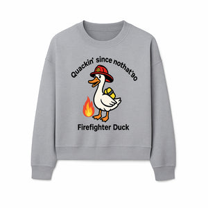 Firefighter Duck Design - Quackin' Since '90 Funny Fireman Graphic for Animal Lovers and Firefighting Enthusiasts - Sweatshirt 1757912477310.jpg