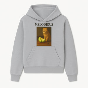 Melodious Cat Art Print - Cute Feline with Melon Still Life - Whimsical Home Decor for Cat Lovers - Hoodie 1758181707145.jpg