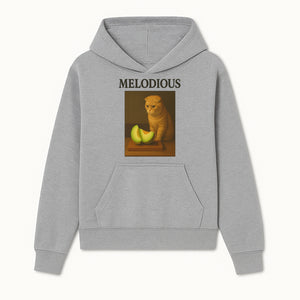 Melodious Cat Art Print - Cute Feline with Melon Still Life - Whimsical Home Decor for Cat Lovers - Hoodie 1758181707706.jpg
