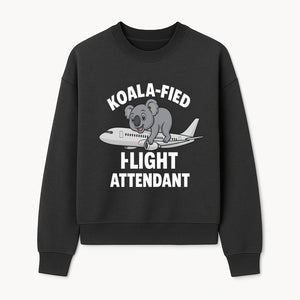 Koala-Fied Flight Attendant T-Shirt | Cute Aviation Animal Graphic Tee for Travelers & Flight Crew | Fun Gifts for Air Travel Lovers - Sweatshirt 1758254677730.jpg