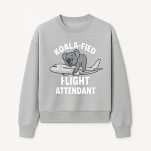 Koala-Fied Flight Attendant T-Shirt | Cute Aviation Animal Graphic Tee for Travelers & Flight Crew | Fun Gifts for Air Travel Lovers - Sweatshirt 1758254678054.jpg