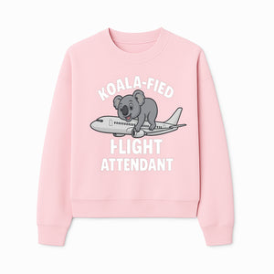 Koala-Fied Flight Attendant T-Shirt | Cute Aviation Animal Graphic Tee for Travelers & Flight Crew | Fun Gifts for Air Travel Lovers - Sweatshirt 1758254678386.jpg