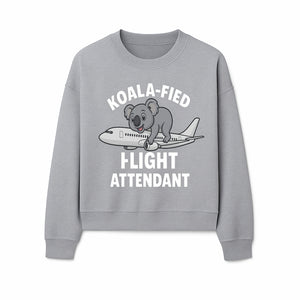 Koala-Fied Flight Attendant T-Shirt | Cute Aviation Animal Graphic Tee for Travelers & Flight Crew | Fun Gifts for Air Travel Lovers - Sweatshirt 1758254678996.jpg
