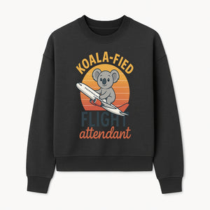 Koala-Fied Flight Attendant T-Shirt | Cute Koala Air Travel Graphic Tee | Fun Animal Pilot Gift for Travel Lovers - Sweatshirt 1758254708079.jpg