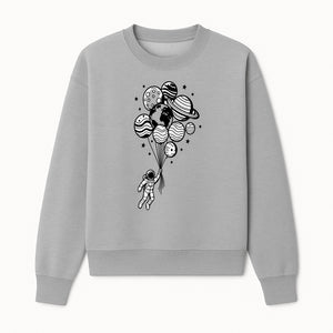 Astronaut Holding Planet Balloons Graphic T-Shirt | Space Adventure Design | Galaxy-Themed Apparel for Kids and Adults - Sweatshirt 1758273119904.jpg