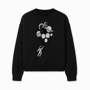 Astronaut Holding Planet Balloons Graphic T-Shirt | Space Adventure Design | Galaxy-Themed Apparel for Kids and Adults - Sweatshirt 1758273120043.jpg