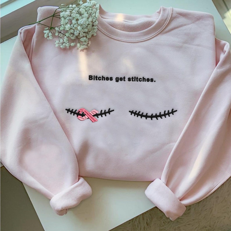 Embroidered Breast Cancer Survivor Sweatshirt Hoodie Bitches Get Stitches 1758338454751.jpg