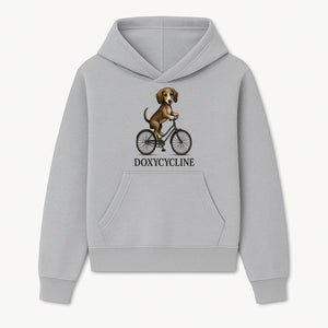 Doxycycline Dog Bicycle Art Print | Cute Dog Riding Bike Wall Decor | Pet Lover Gift | Whimsical Animal Illustration - Hoodie 1758347420601.jpg