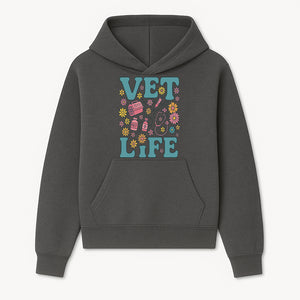 Vet Life Graphic Tee | Colorful Vet Inspired T-Shirt with Pet Icons and Flowers | Perfect Gift for Animal Lovers and Vets - Hoodie 1758347420918.jpg