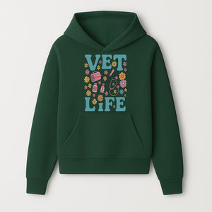 Vet Life Graphic Tee | Colorful Vet Inspired T-Shirt with Pet Icons and Flowers | Perfect Gift for Animal Lovers and Vets - Hoodie 1758347421068.jpg