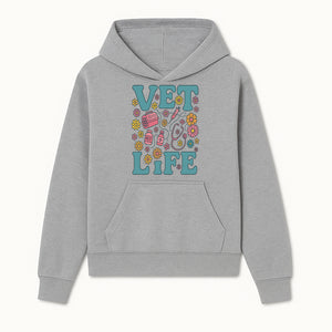 Vet Life Graphic Tee | Colorful Vet Inspired T-Shirt with Pet Icons and Flowers | Perfect Gift for Animal Lovers and Vets - Hoodie 1758347421250.jpg