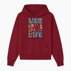 Vet Life Graphic Tee | Colorful Vet Inspired T-Shirt with Pet Icons and Flowers | Perfect Gift for Animal Lovers and Vets - Hoodie 1758347421641.jpg