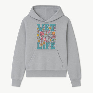 Vet Life Graphic Tee | Colorful Vet Inspired T-Shirt with Pet Icons and Flowers | Perfect Gift for Animal Lovers and Vets - Hoodie 1758347422033.jpg